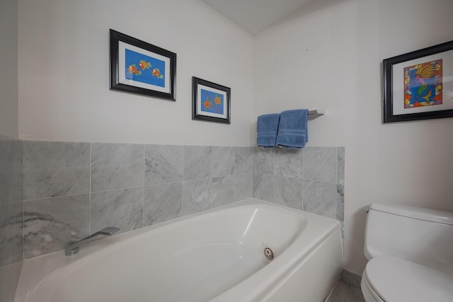 115 Front St Unit 202, Key West, FL 33040 - bathroom featuring a washtub and toilet