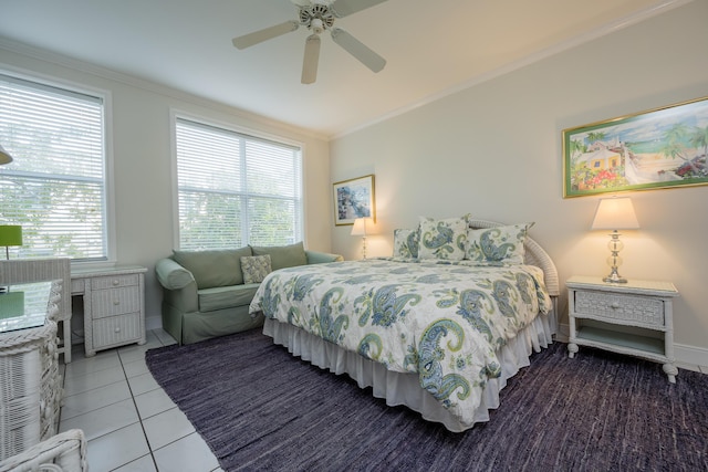 115 Front St Unit 202, Key West, FL 33040 - bedroom featuring crown molding, ceiling fan, tile patterned floors, and multiple windows