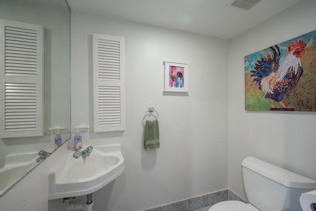 115 Front St Unit 202, Key West, FL 33040 - bathroom featuring sink and toilet