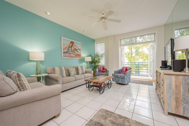 tiled living room featuring ceiling fan