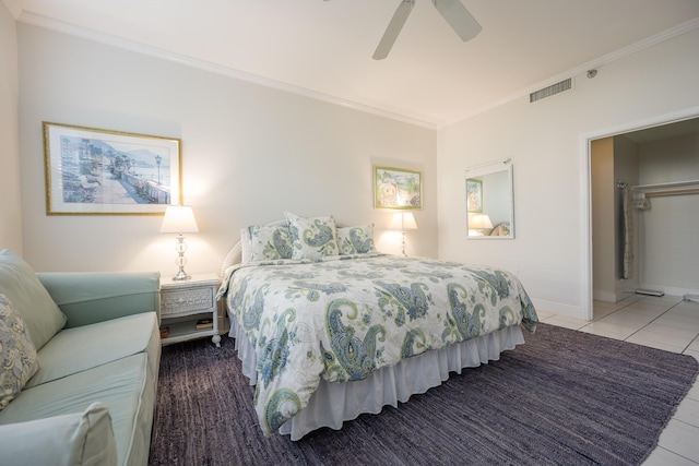 115 Front St Unit 202, Key West, FL 33040 - tiled bedroom featuring ornamental molding and ceiling fan
