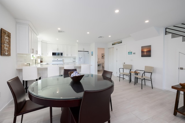 dining room with sink