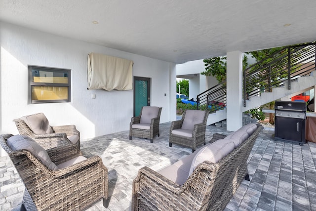 view of patio featuring outdoor lounge area and grilling area