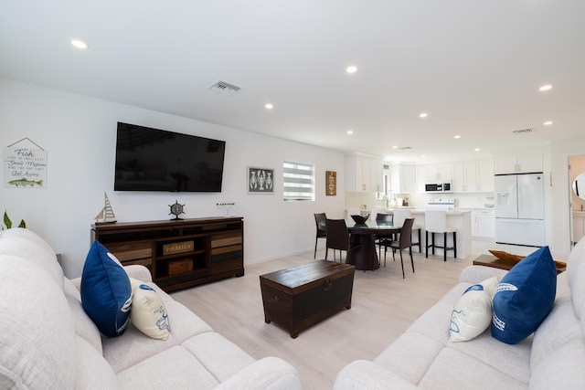 living room with light wood-type flooring