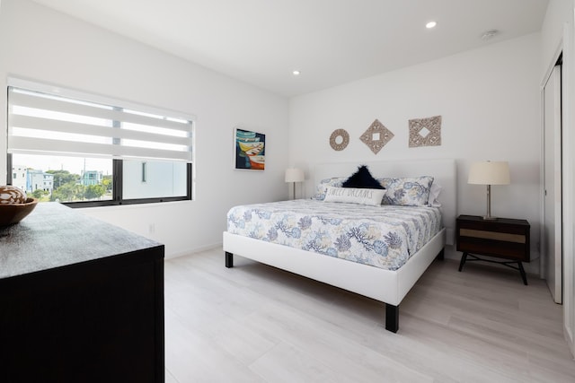 bedroom featuring light hardwood / wood-style floors