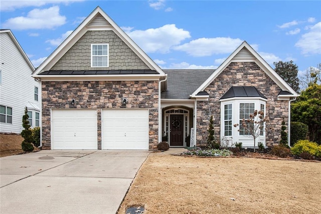 view of front of property with a garage