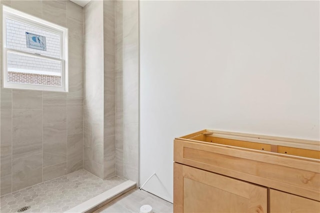 bathroom with a shower stall