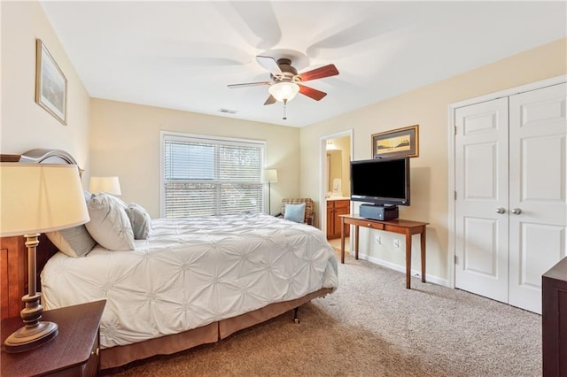 bedroom featuring carpet flooring, a ceiling fan, baseboards, visible vents, and a closet