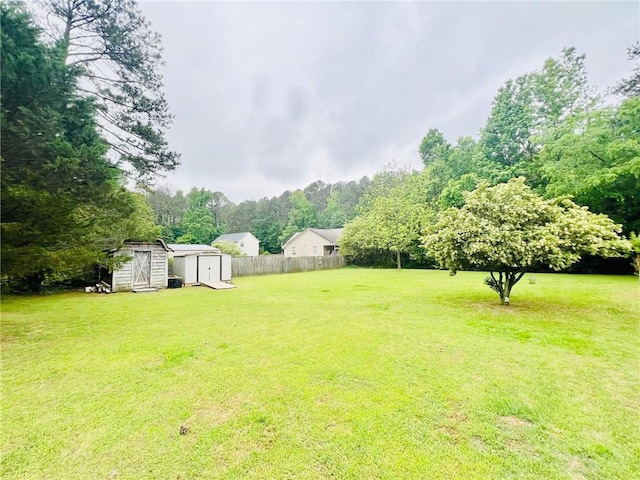 31 Cline Dr SW, Cartersville, GA 30120 - view of yard featuring a storage unit and an outbuilding