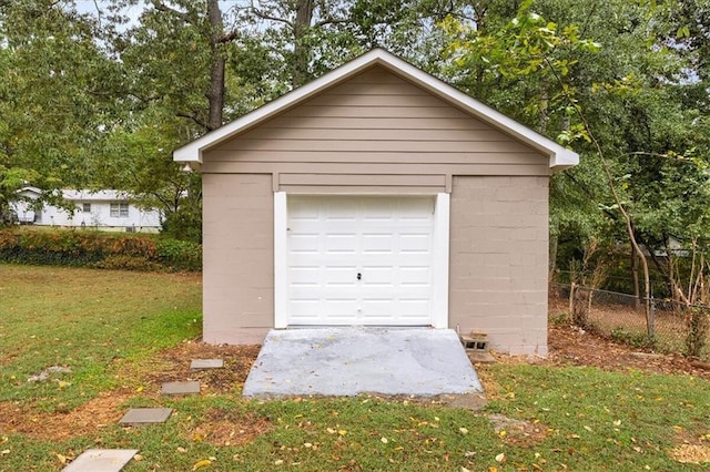 garage with a lawn