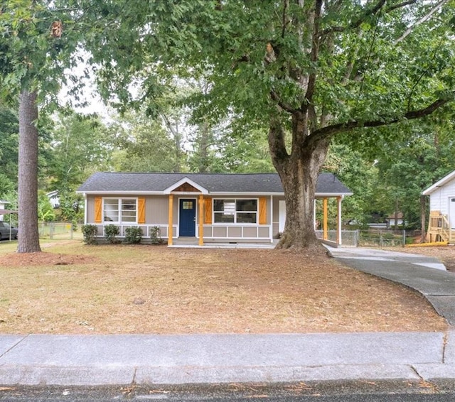 ranch-style home featuring a porch