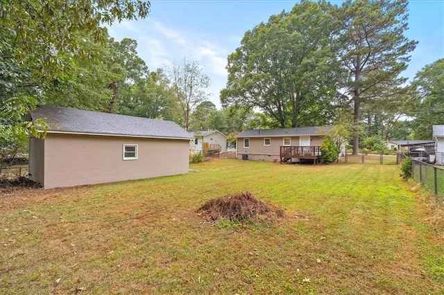 view of yard with a deck