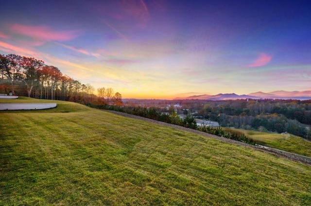 yard at dusk with a mountain view