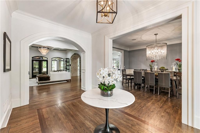 15595 Birmingham Hwy, Alpharetta, GA 30004 - dining space featuring a chandelier, arched walkways, wood finished floors, and ornamental molding