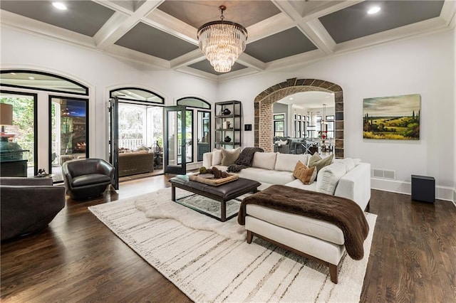 15595 Birmingham Hwy, Alpharetta, GA 30004 - living area featuring coffered ceiling, a chandelier, arched walkways, beamed ceiling, and recessed lighting