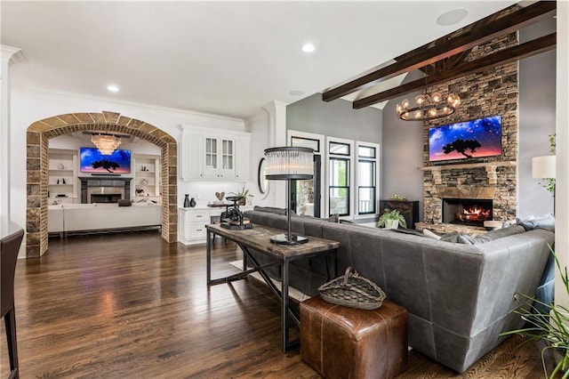 15595 Birmingham Hwy, Alpharetta, GA 30004 - living room with a stone fireplace, dark wood-type flooring, a chandelier, and beamed ceiling