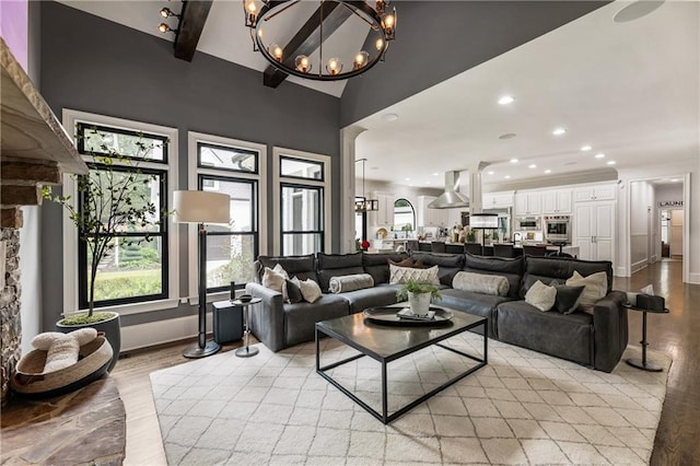 15595 Birmingham Hwy, Alpharetta, GA 30004 - living room featuring a chandelier, light wood-style floors, recessed lighting, and healthy amount of natural light