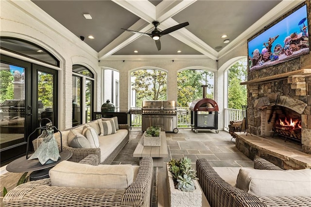 15595 Birmingham Hwy, Alpharetta, GA 30004 - view of patio / terrace featuring an outdoor living space with a fireplace, ceiling fan, and grilling area
