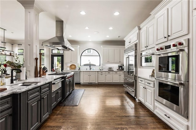 15595 Birmingham Hwy, Alpharetta, GA 30004 - kitchen featuring stainless steel appliances, island range hood, white cabinetry, dark wood-style flooring, and dark cabinetry