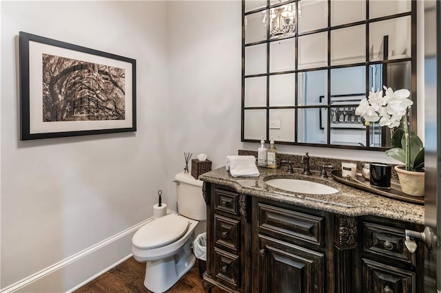 15595 Birmingham Hwy, Alpharetta, GA 30004 - half bath with vanity, wood finished floors, and a chandelier