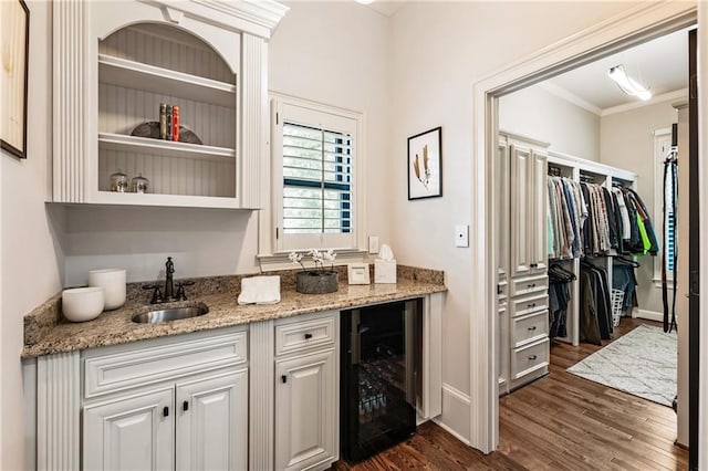15595 Birmingham Hwy, Alpharetta, GA 30004 - bar featuring wine cooler, dark wood-type flooring, and ornamental molding