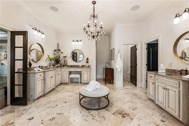 15595 Birmingham Hwy, Alpharetta, GA 30004 - bathroom featuring crown molding, two vanities, and a chandelier