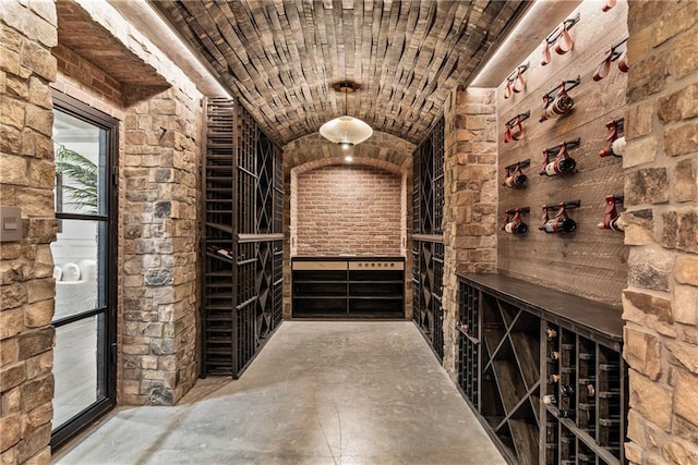 15595 Birmingham Hwy, Alpharetta, GA 30004 - wine room featuring concrete flooring and vaulted ceiling
