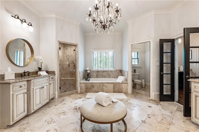 15595 Birmingham Hwy, Alpharetta, GA 30004 - bathroom featuring vanity, ornamental molding, a garden tub, a chandelier, and a shower stall