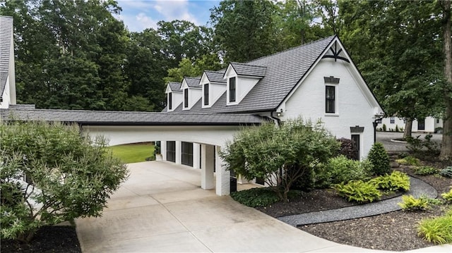 15595 Birmingham Hwy, Alpharetta, GA 30004 - view of side of home with concrete driveway and brick siding