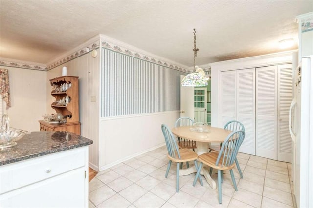 1526 N Cherokee Rd N, Social Circle, GA 30025 - dining space featuring a textured ceiling and crown molding