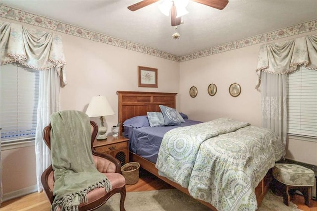1526 N Cherokee Rd N, Social Circle, GA 30025 - bedroom with wood finished floors and a ceiling fan