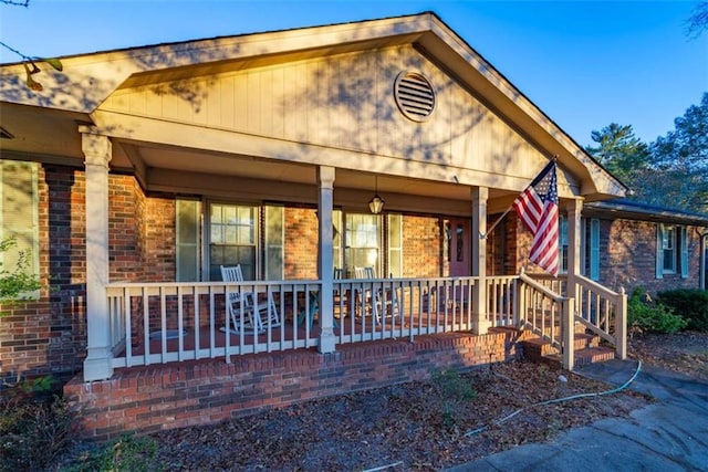 1526 N Cherokee Rd N, Social Circle, GA 30025 - view of front of home with brick siding and a porch