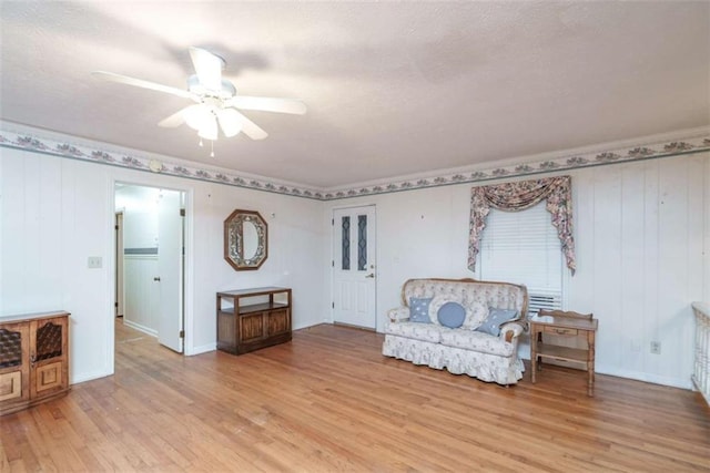 1526 N Cherokee Rd N, Social Circle, GA 30025 - sitting room with ceiling fan, light wood-type flooring, crown molding, and baseboards