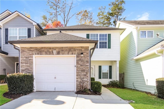 view of front of property with a garage