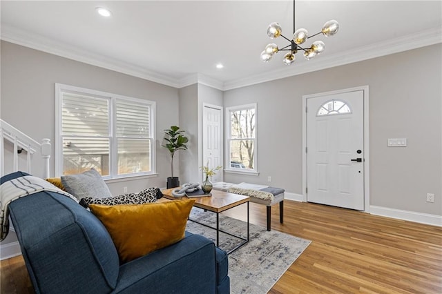 2453 Paul Ave NW, Atlanta, GA 30318 - living area with a chandelier, light wood-style floors, crown molding, and recessed lighting