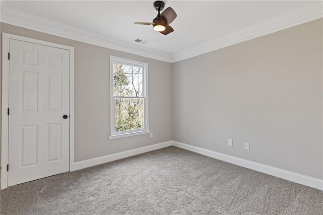 2453 Paul Ave NW, Atlanta, GA 30318 - carpeted empty room with ornamental molding and ceiling fan