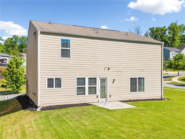 1560 Avalon Creek Rd, Sugar Hill, GA 30518 - rear view of property featuring a lawn