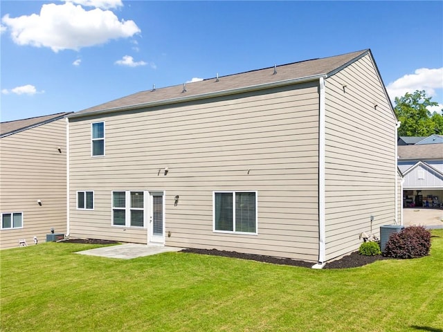 1560 Avalon Creek Rd, Sugar Hill, GA 30518 - back of house featuring a lawn and a patio area
