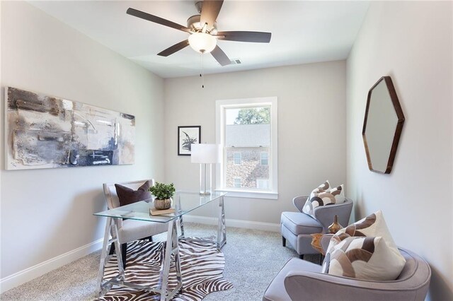 bedroom with light carpet, visible vents, a ceiling fan, and baseboards