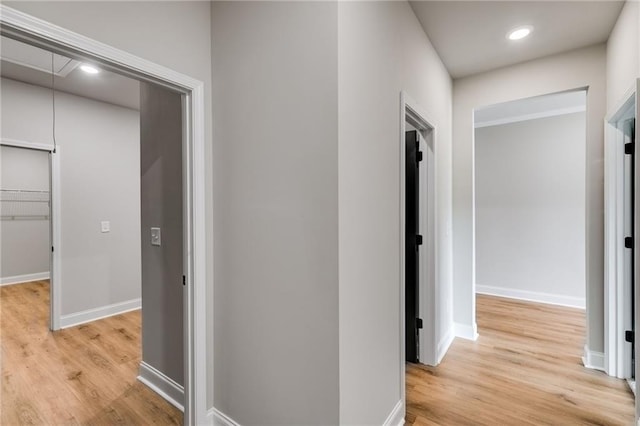 8971 Callaway Dr, Winston, GA 30187 - corridor with recessed lighting, baseboards, attic access, and light wood-type flooring