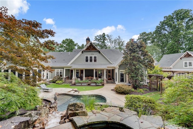 back of property with a patio area