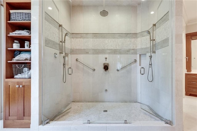 bathroom featuring a shower with shower door