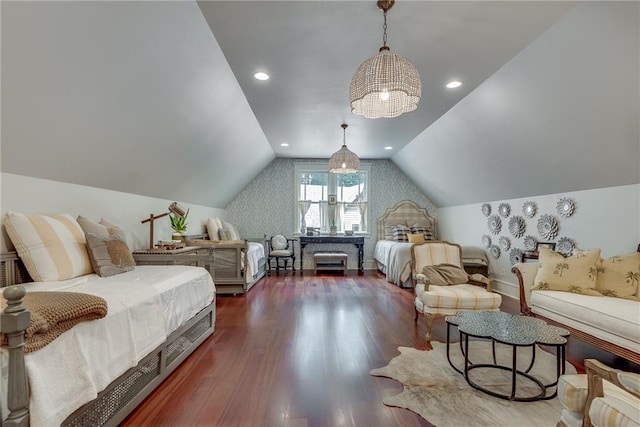 bedroom featuring lofted ceiling and dark hardwood / wood-style floors