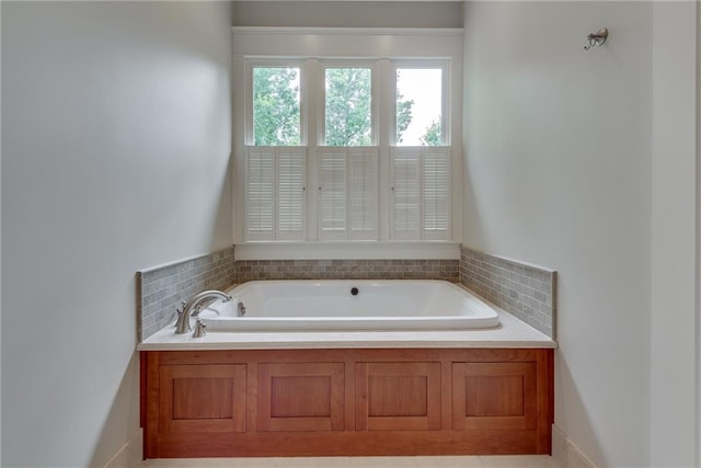 bathroom featuring a tub