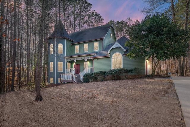 victorian home featuring covered porch