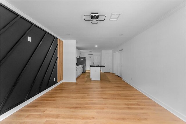 1111 Osborne St SW, Atlanta, GA 30310 - hall with recessed lighting, light wood-style floors, visible vents, and baseboards