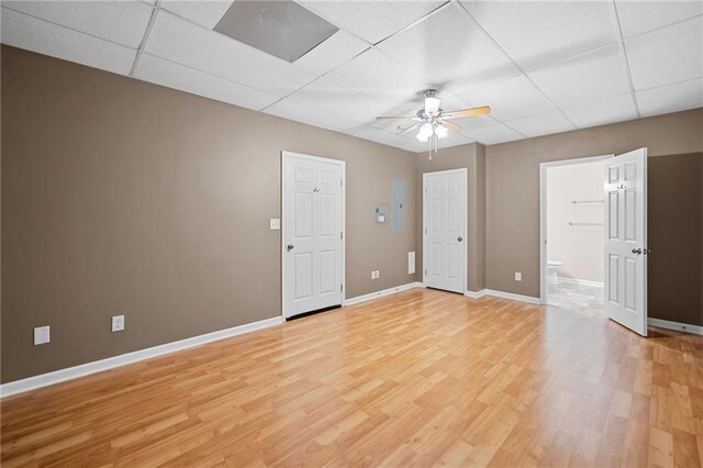 412 Gray Fox Dr, Canton, GA 30114 - unfurnished room featuring a paneled ceiling, a ceiling fan, and light wood-type flooring