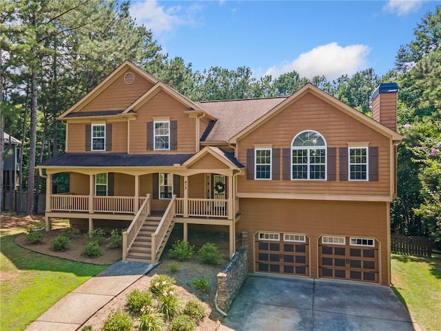 412 Gray Fox Dr, Canton, GA 30114 - view of front of house featuring a porch, an attached garage, a chimney, driveway, and stairs