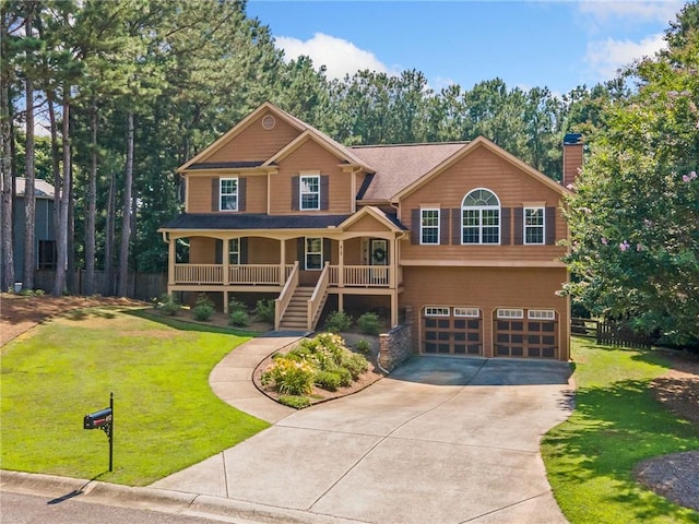 412 Gray Fox Dr, Canton, GA 30114 - view of front facade with covered porch, an attached garage, driveway, a chimney, and stairway