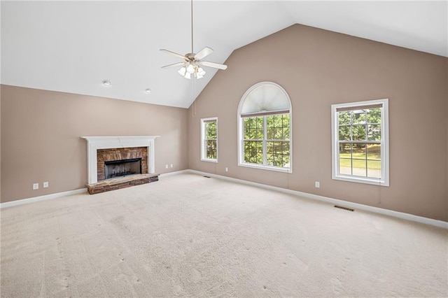 412 Gray Fox Dr, Canton, GA 30114 - unfurnished living room featuring a ceiling fan, carpet floors, a brick fireplace, and high vaulted ceiling